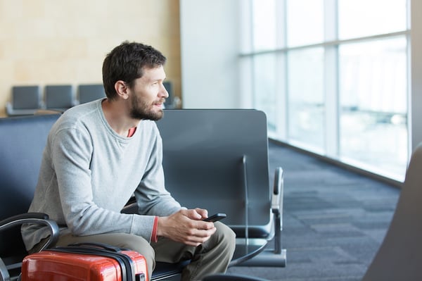 bearded-man-in-airport-lounge