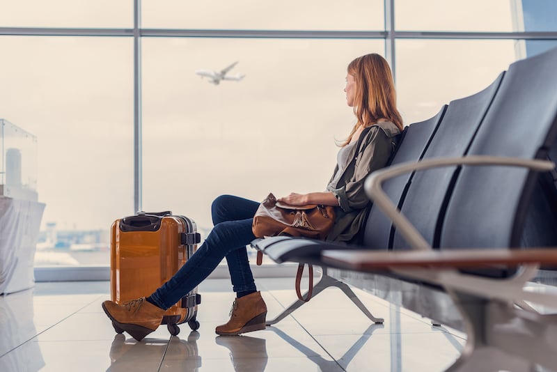 woman-waiting-airport-terminal