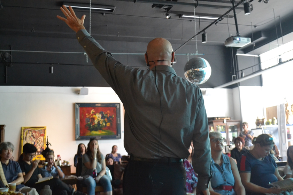 view of andrew hallam presenting to an audience