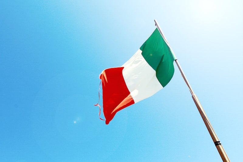 italian flag against blue sky
