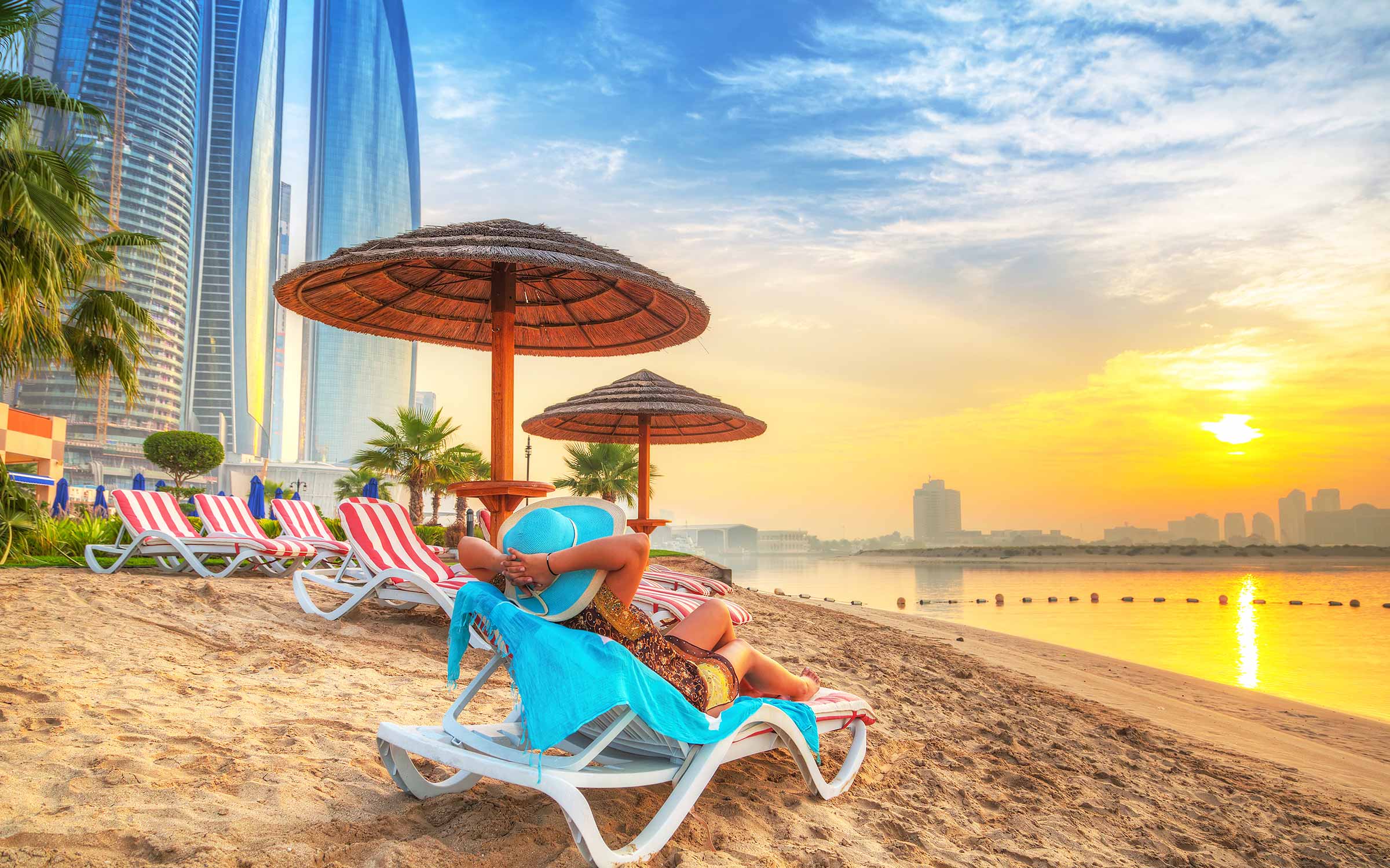 woman sun lounger UAE beach